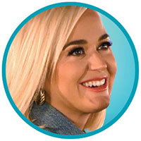 Katy Perry smiles.