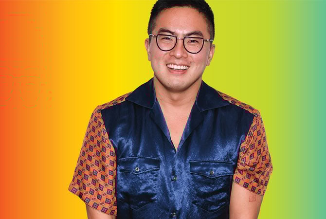 picture of Bowen Yang in front of a colorful background