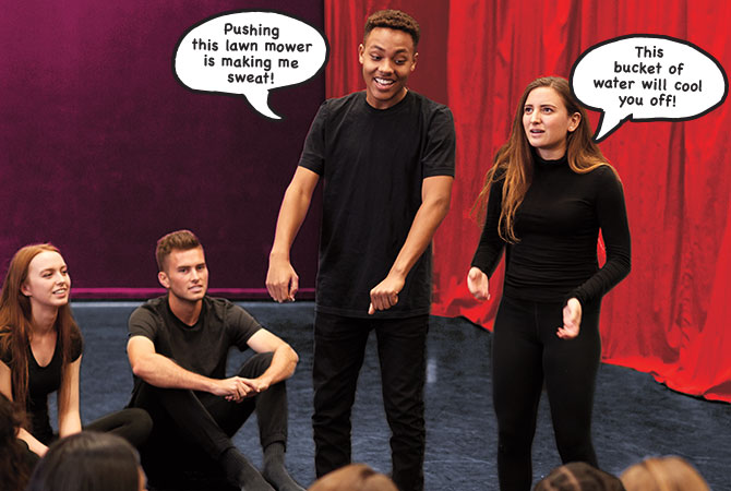A group of teens on a stage. All of their hands are empty.