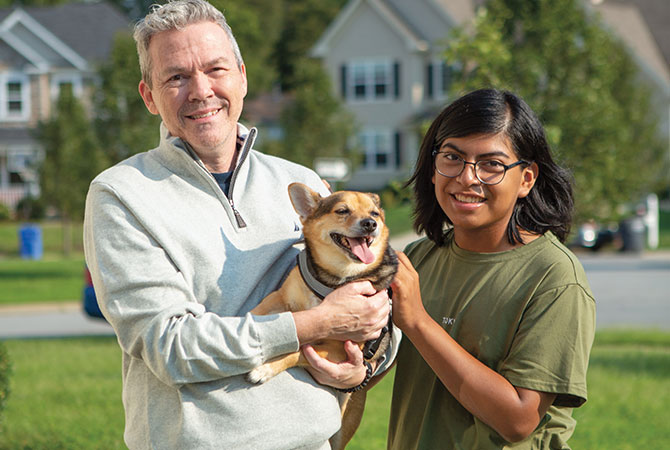 A daughter, her dad, and their dog