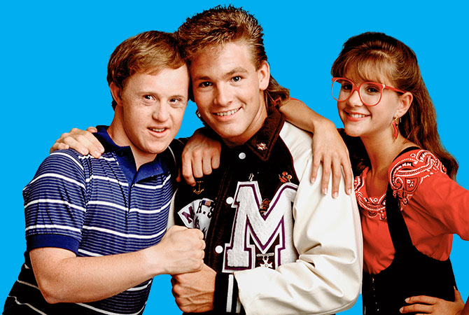 Three teens posing for a picture