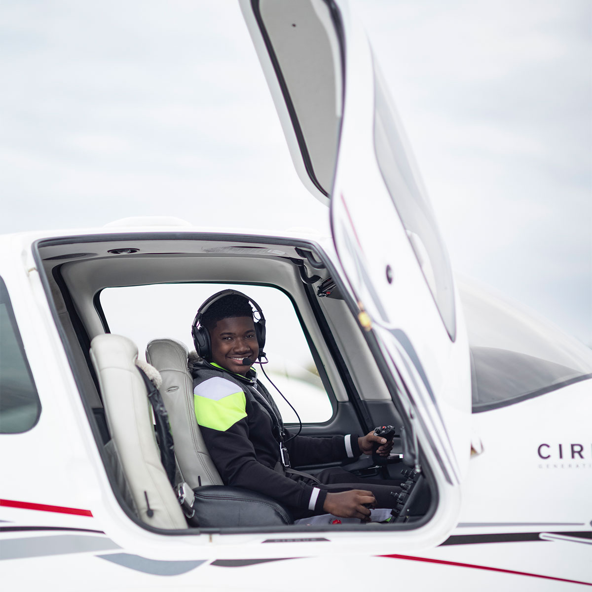 Image of a teen flying a plane