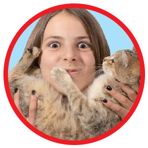 Image of a teen holding a kitten