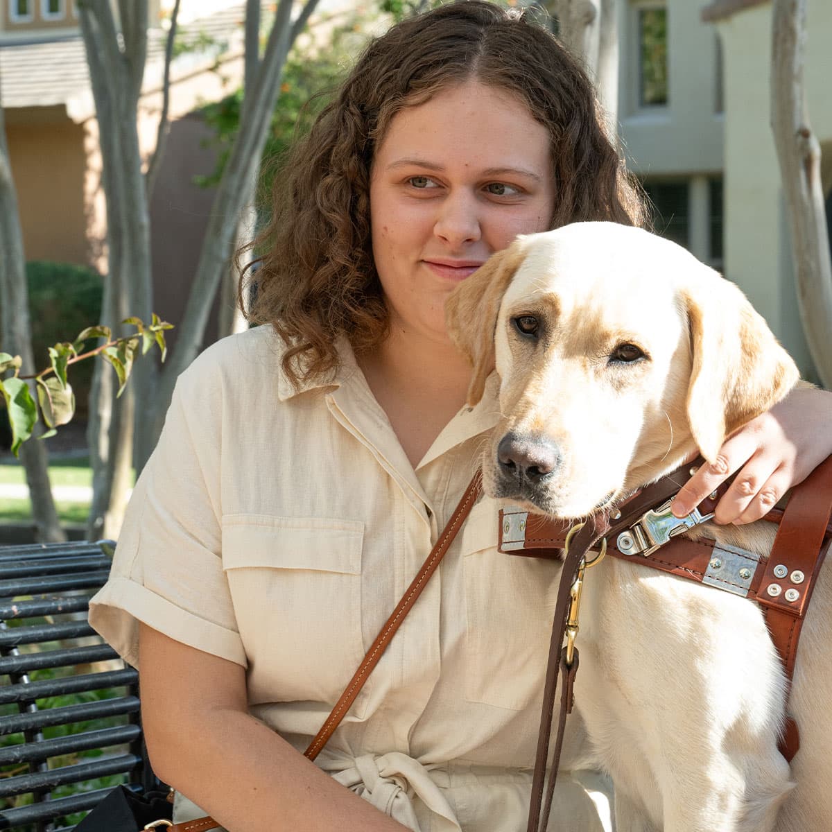 Image of person posing with their service dog