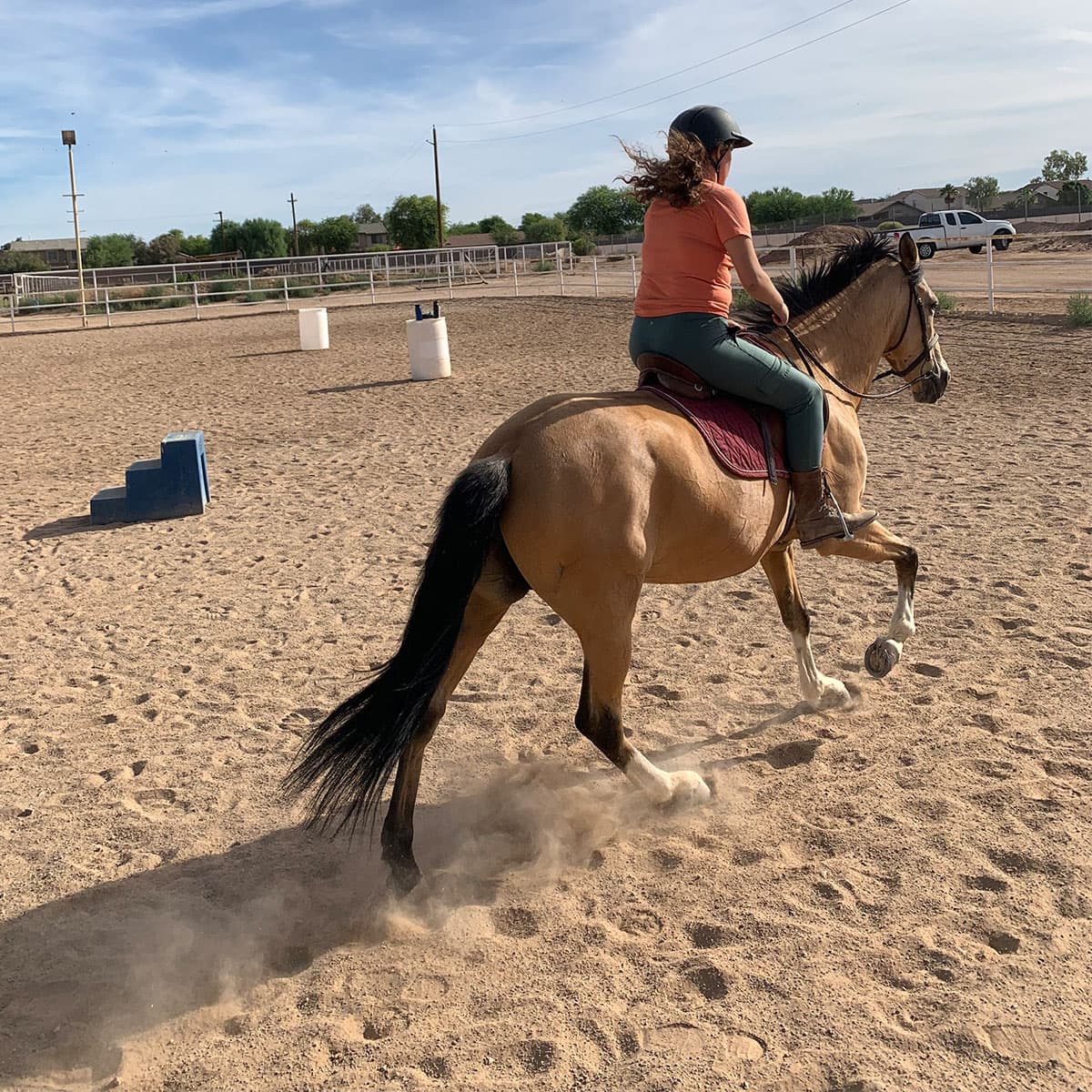 Image of person riding a horse